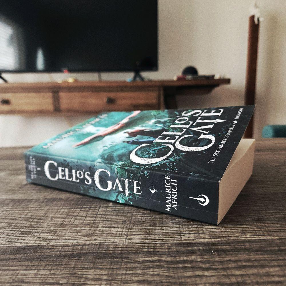Unsigned Edition: Cello's Gate (The Sky Pirates of Imperia 1) by Maurice Africh